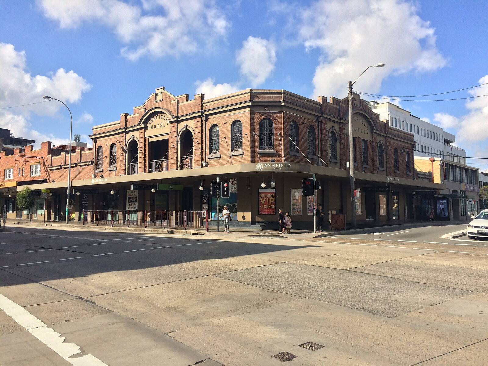 Two-storey red brick Ashfield Hotel on the corner of Liverpool Road and Holden Street