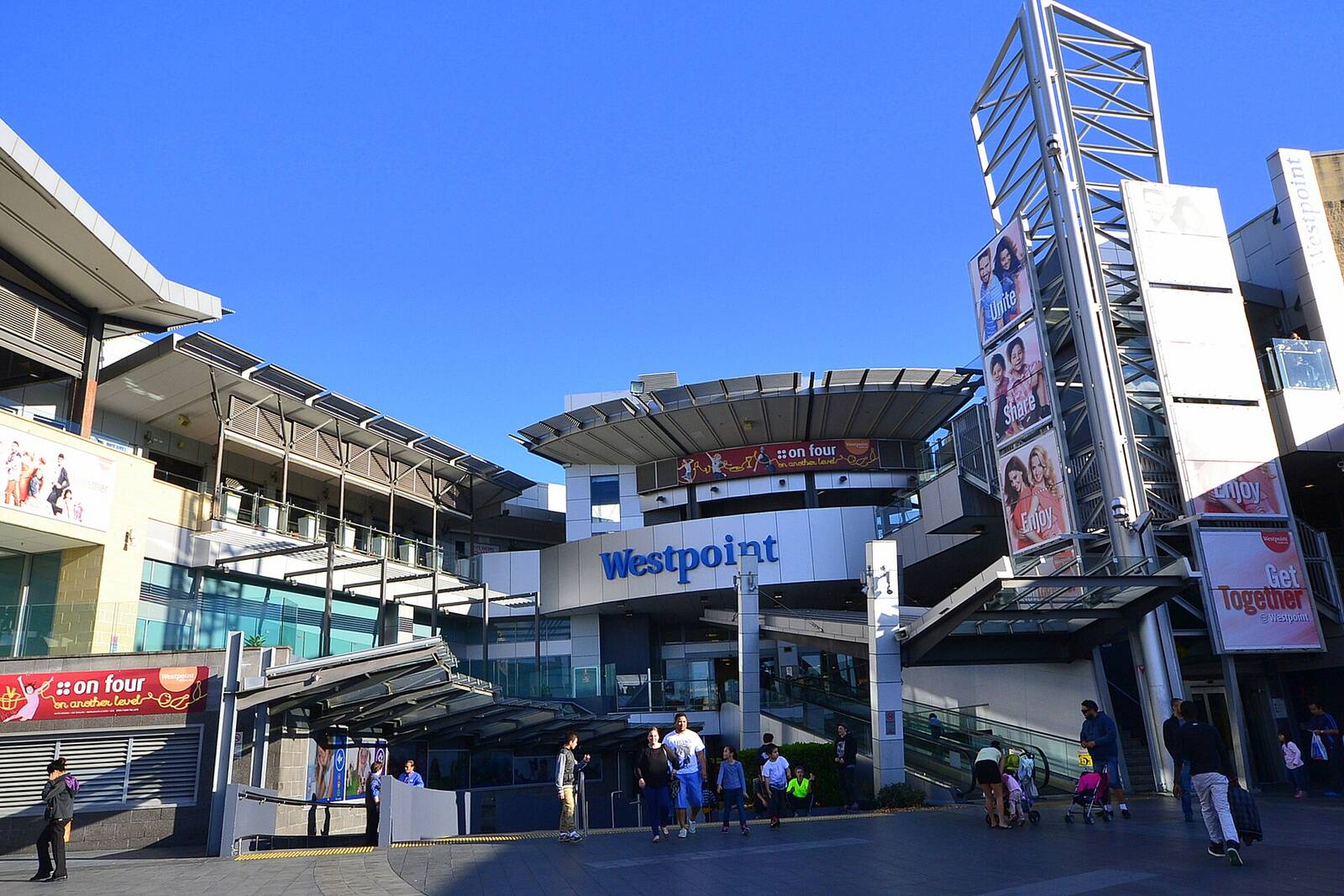 Westpoint Blacktown shopping centre entrance with its curved canopy and escalators
