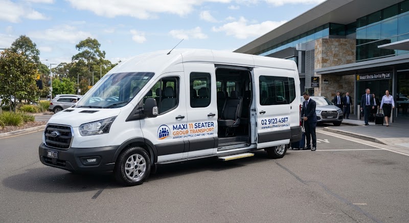 Silver Sydney Taxi 11 seat maxi cab parked kerbside