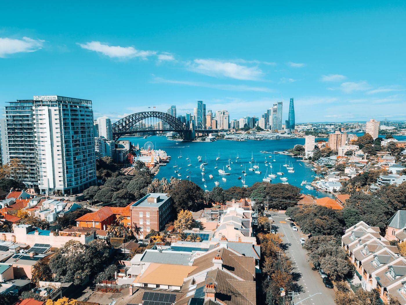 Aerial view over Lavender Bay and Milsons Point towards the Harbour Bridge and city skyline