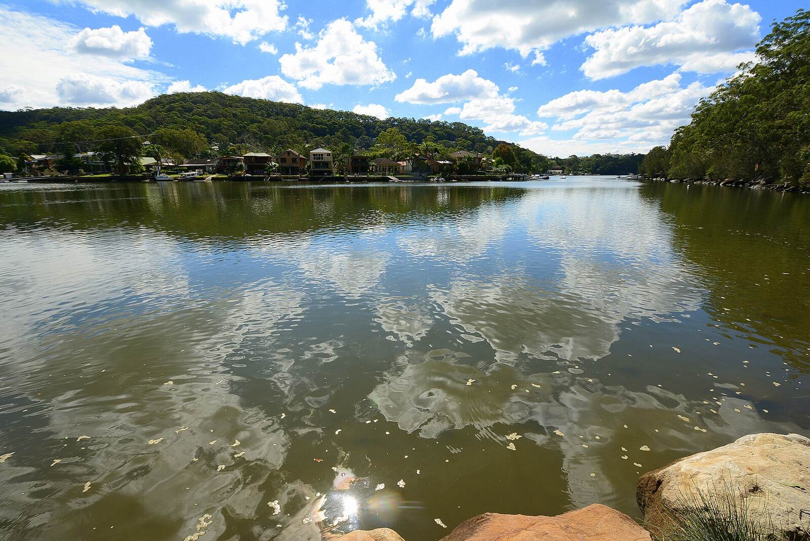 The Woronora River seen from Prince Edward Park, with bushland and waterfront houses on the far bank